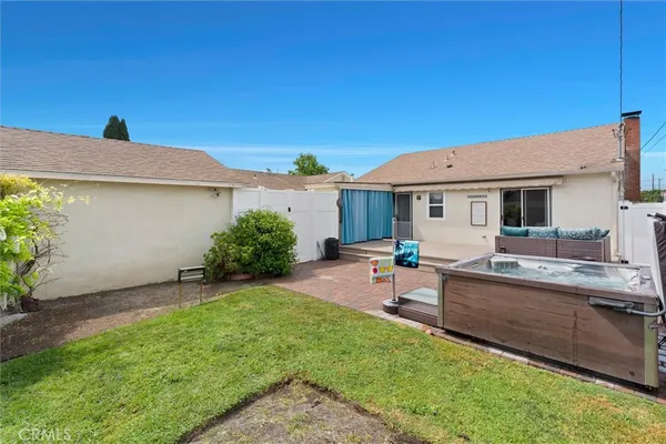 a view of a backyard with a garden and plants