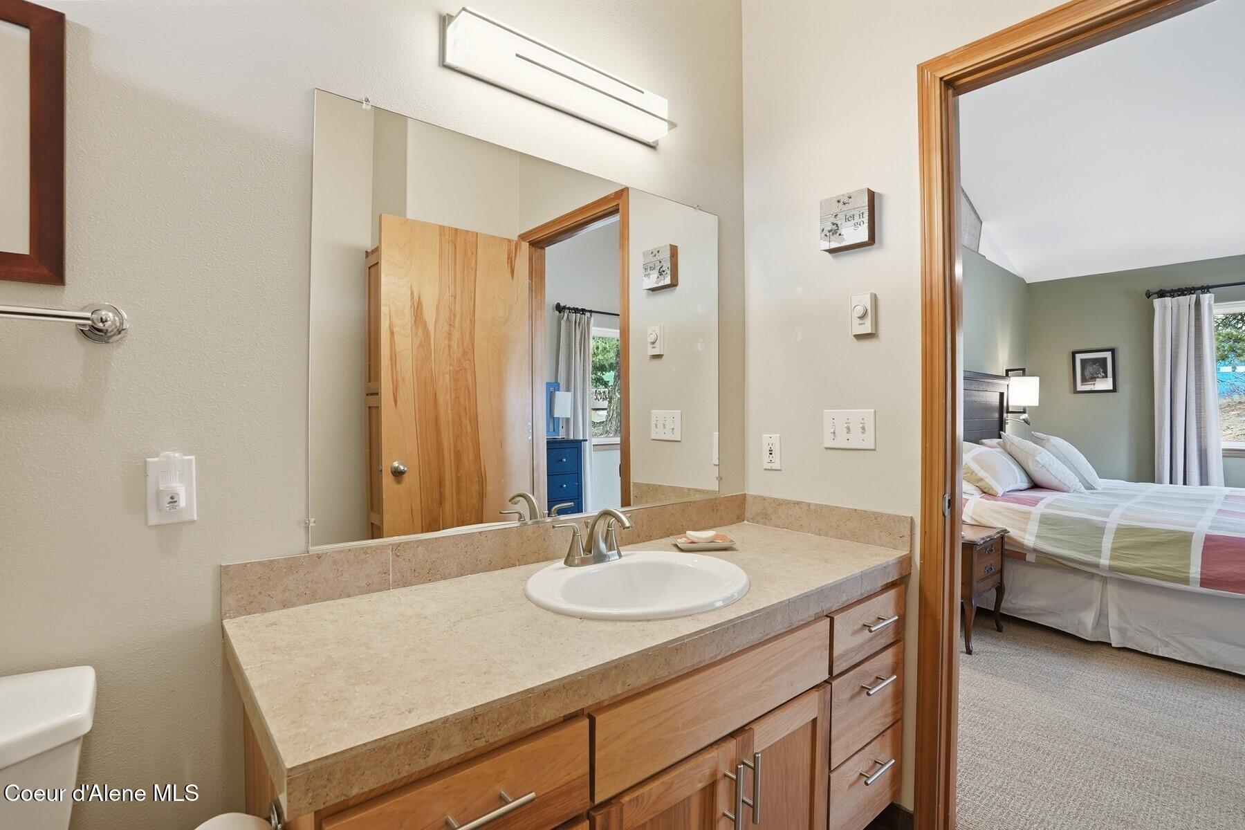 1149 Dunromin Road Priest River, ID 83856 - Photo 11 of 53 Bathroom vanity hallway view