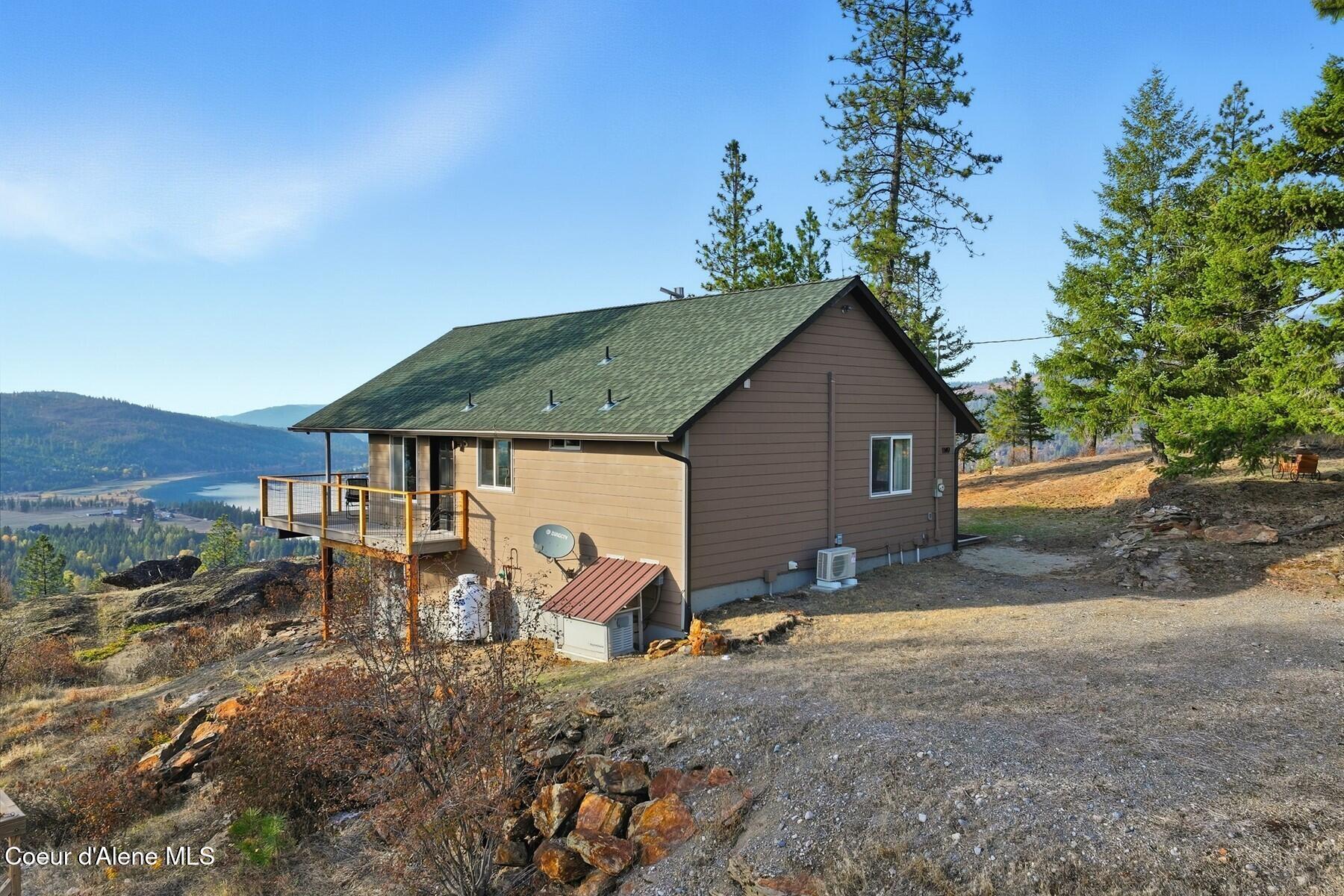 1149 Dunromin Road Priest River, ID 83856 - Photo 24 of 53 Hillside cabin side view