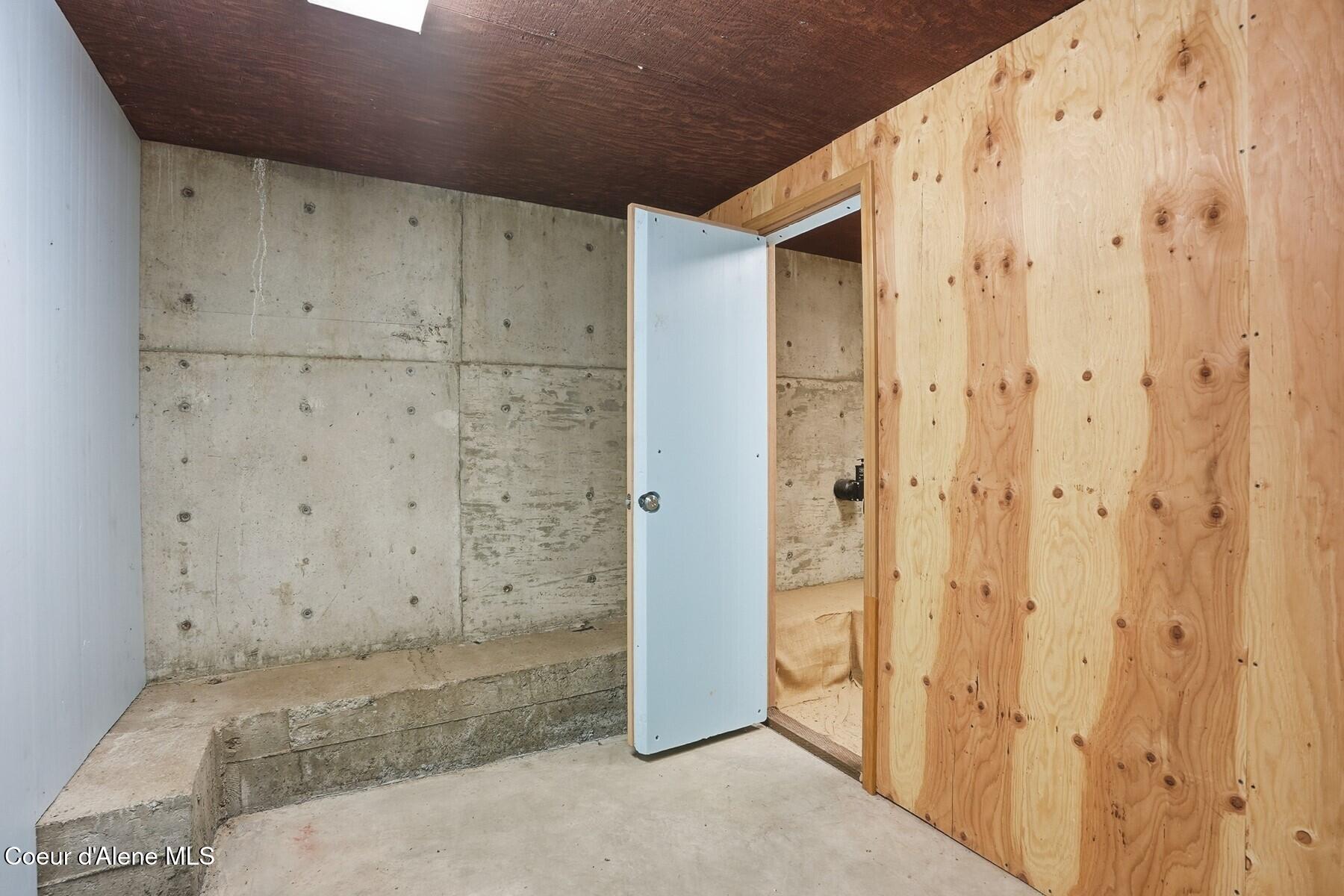 1149 Dunromin Road Priest River, ID 83856 - Photo 34 of 53 Concrete storage room