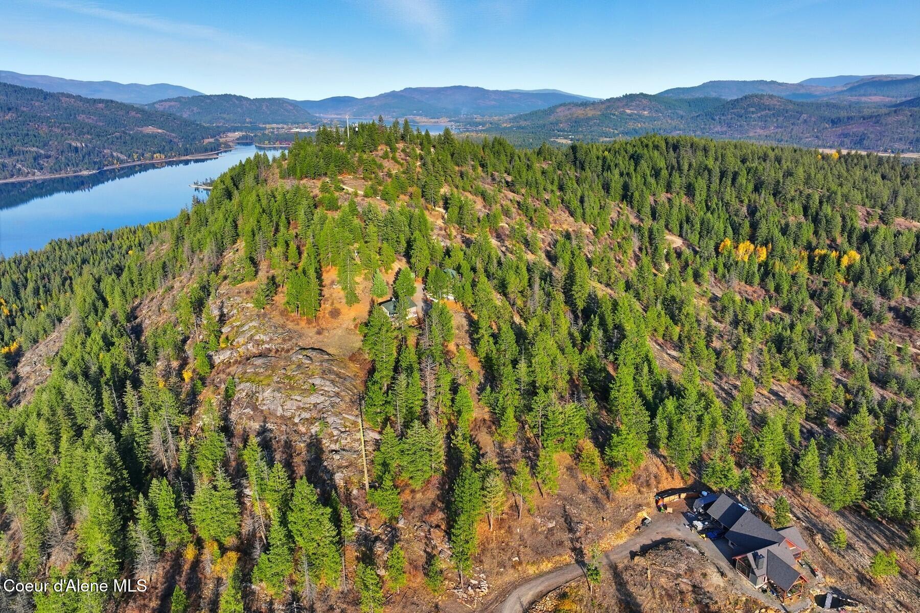 1149 Dunromin Road Priest River, ID 83856 - Photo 38 of 53 Forested hillside lake view