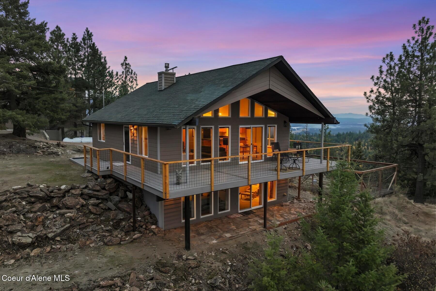 1149 Dunromin Road Priest River, ID 83856 - Photo 42 of 53 Cabin illuminated exterior night
