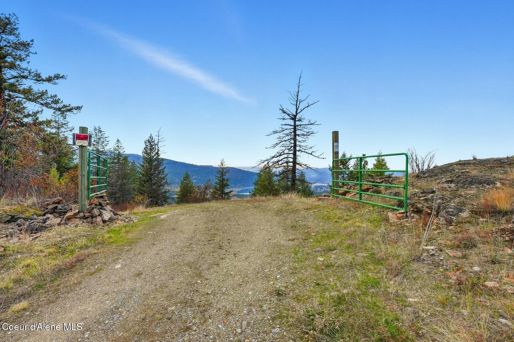 1149 Dunromin Road Priest River, ID 83856 - Photo 49 of 53 Gravel driveway rural approach