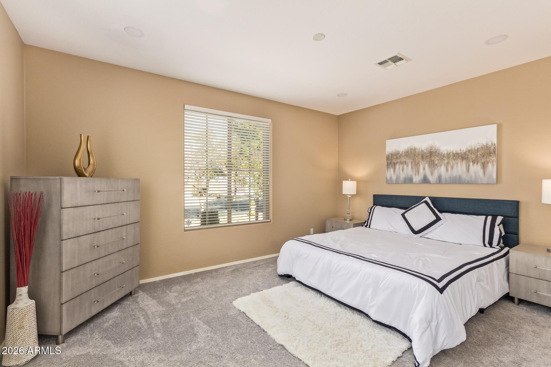 2115 West Branham Lane Phoenix, AZ 85041 - Photo 23 of 35 a bedroom with a bed and a night stand