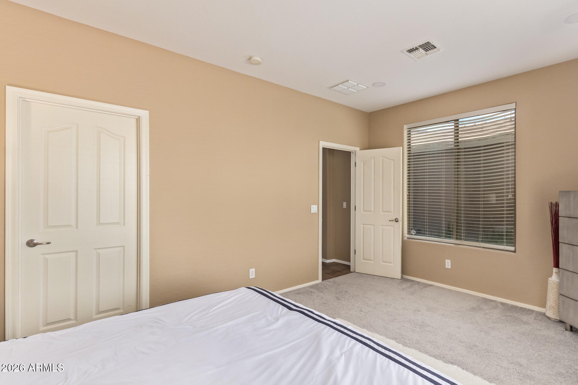 2115 West Branham Lane Phoenix, AZ 85041 - Photo 24 of 35 a view of an empty room with a window
