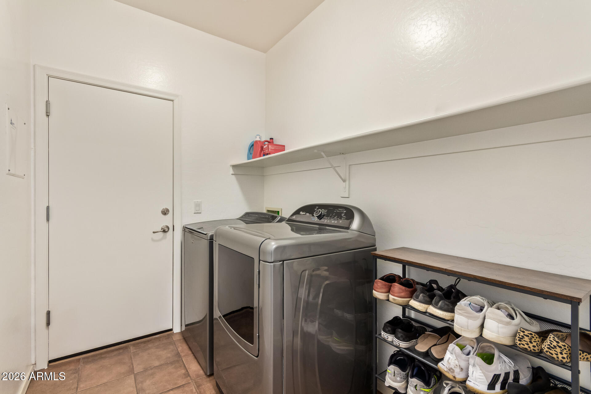 2115 West Branham Lane Phoenix, AZ 85041 - Photo 31 of 35 a utility room with dryer and washer