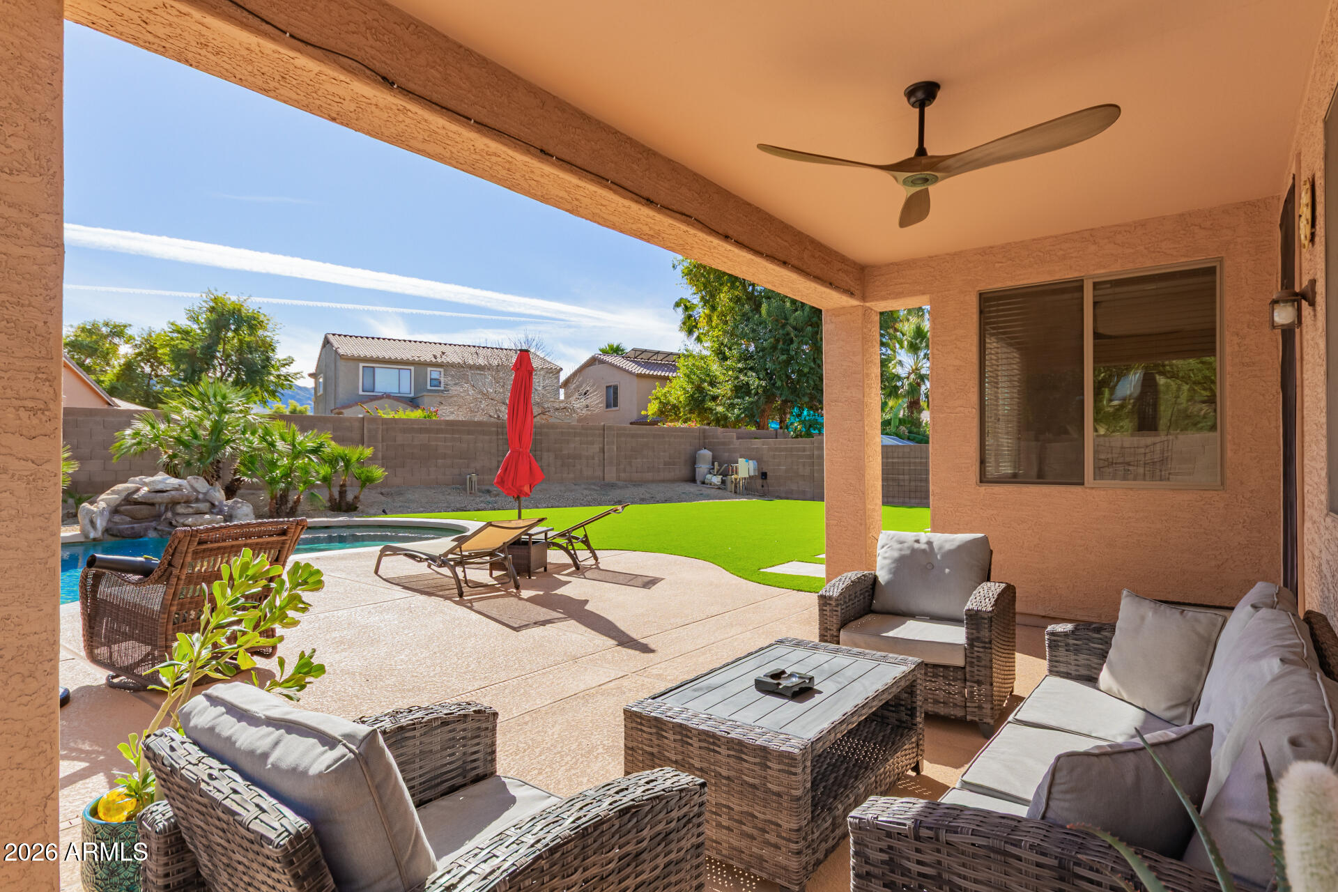 2115 West Branham Lane Phoenix, AZ 85041 - Photo 5 of 35 a view of a patio with couches table and chairs