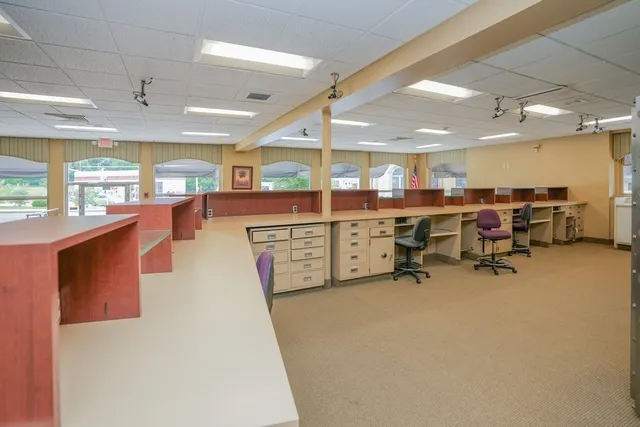 a view of a kitchen with cabinets