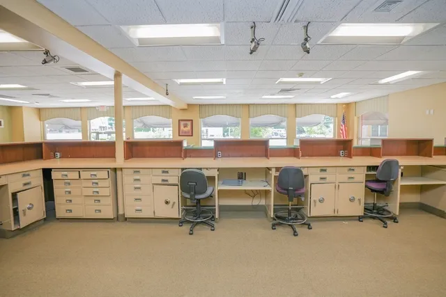 a view of a livingroom with a large window