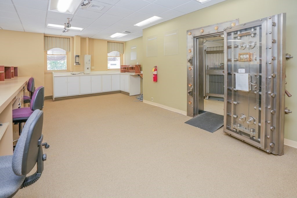 968 Main Street Warren, MA 01083 - Photo 15 of 40 a bathroom with a tub and a shower