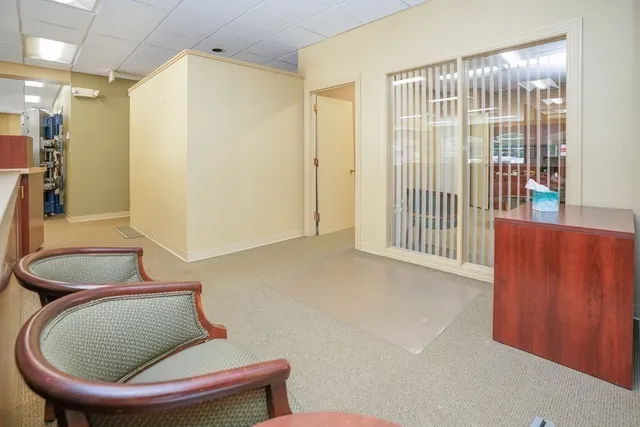 a room with furniture and a window