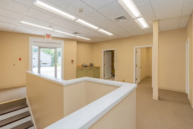 a view of a living room and dining room