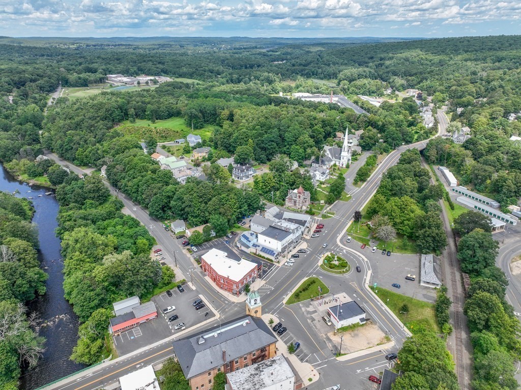 968 Main Street Warren, MA 01083 - Photo 28 of 40 an aerial view of residential houses with outdoor space and trees