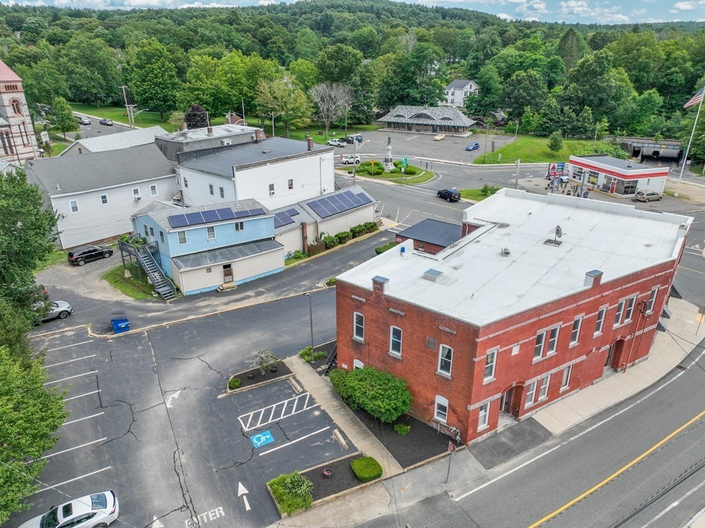 968 Main Street Warren, MA 01083 - Photo 3 of 40 an aerial view of a house with outdoor space and parking