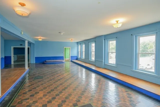 a view of an empty room and window