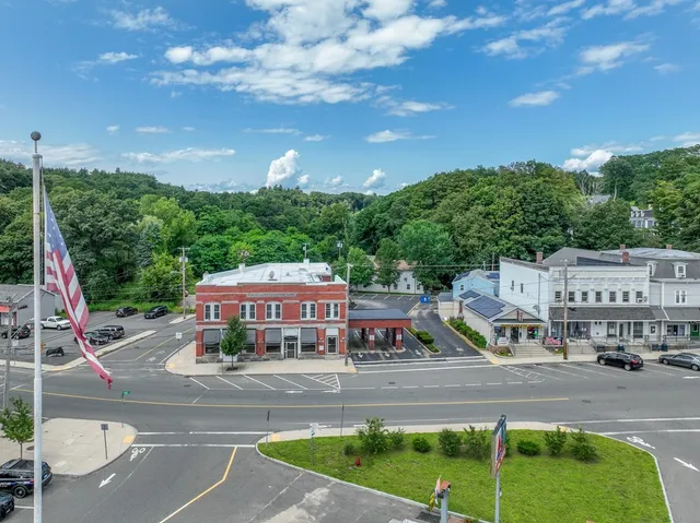 a view of houses with outdoor spaces and yard