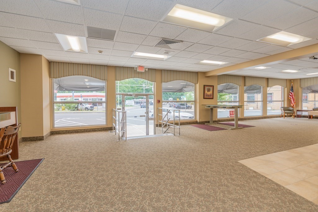 968 Main Street Warren, MA 01083 - Photo 9 of 40 a area with furniture and a large window