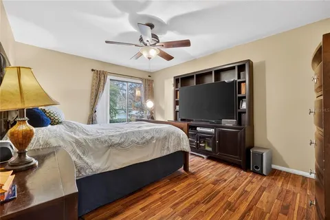 a bathroom with a toilet a sink and shower