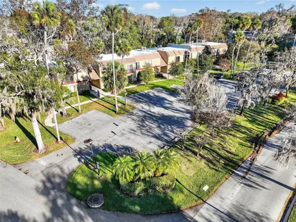a view of a playground with basketball court