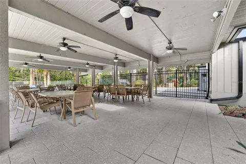 a view of a swimming pool with a patio