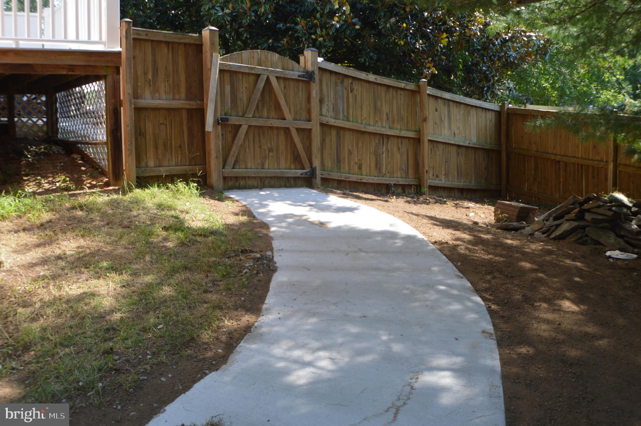 1990 Valley Road Annapolis, MD 21401 - Photo 10 of 74 path from drive to patio/pool area