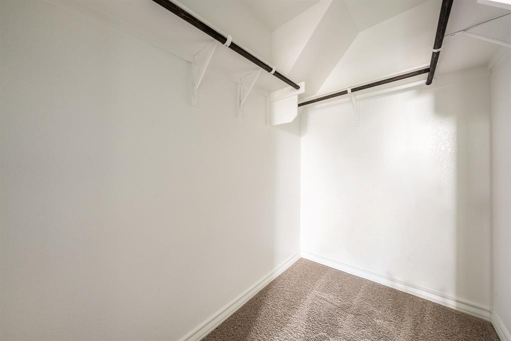 123 Watkinville Road Hutto, TX 78634 - Photo 14 of 30 Walk in closet with carpet flooring