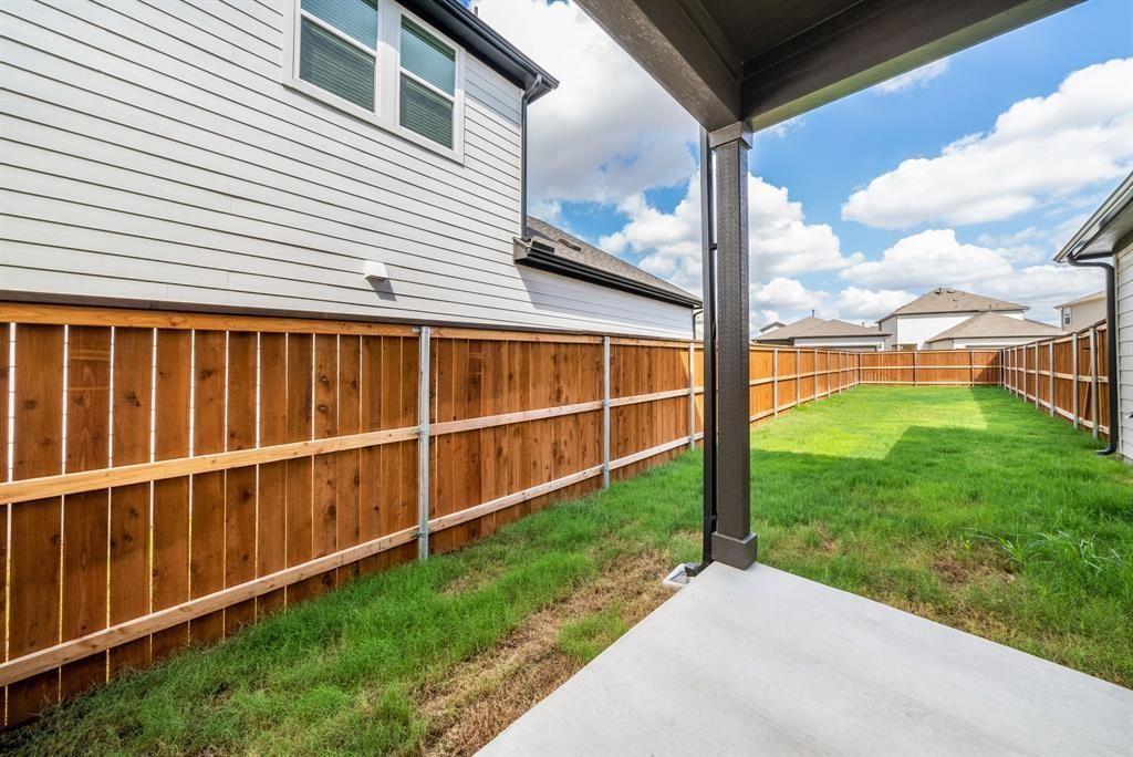 123 Watkinville Road Hutto, TX 78634 - Photo 22 of 30 Fenced backyard with a patio