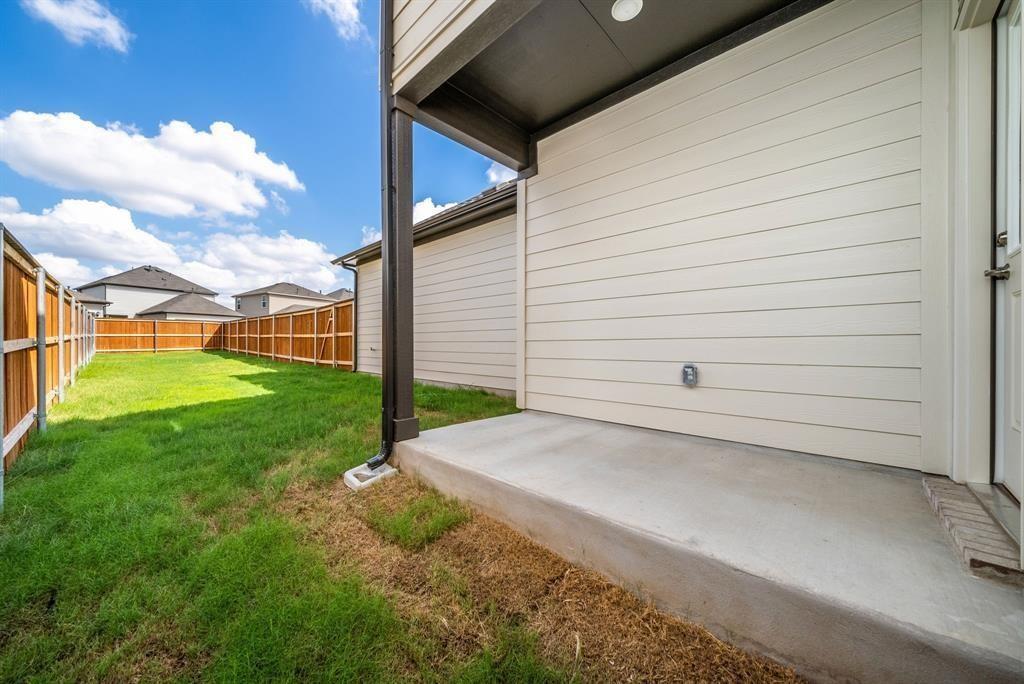 123 Watkinville Road Hutto, TX 78634 - Photo 24 of 30 Fenced backyard featuring a patio