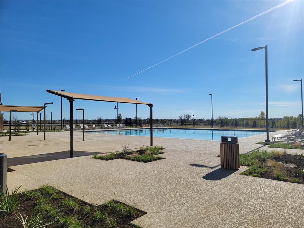123 Watkinville Road Hutto, TX 78634 - Photo 29 of 30 Outdoor pool with a patio area