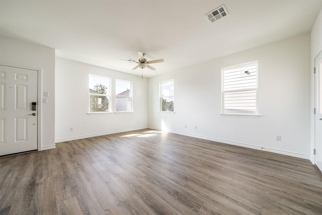 123 Watkinville Road Hutto, TX 78634 - Photo 4 of 30 Entrance foyer with wood finished floors and a ceiling fan