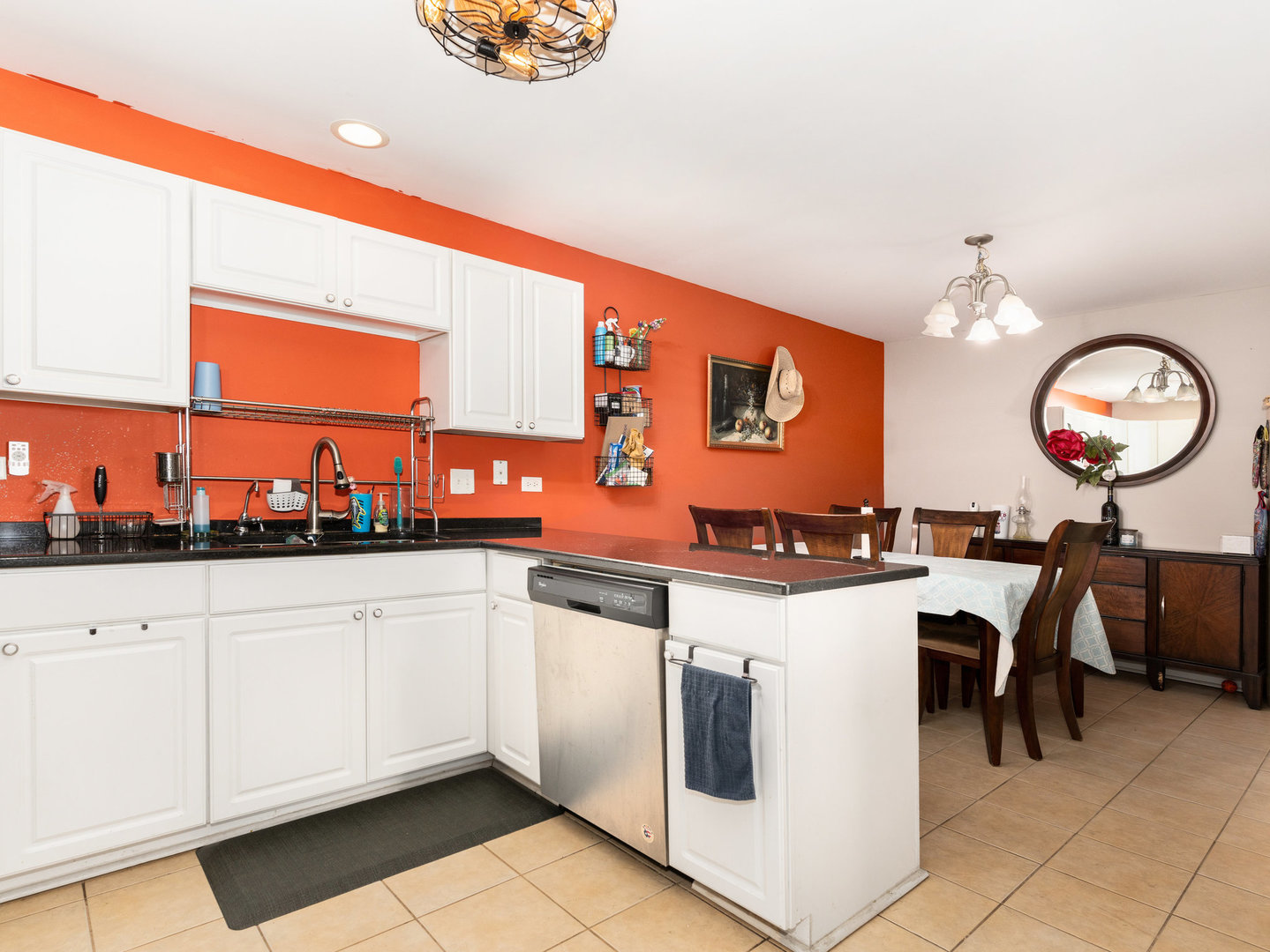 1416 Trailside Drive Beecher, IL 60401 - Photo 7 of 24 a kitchen with stainless steel appliances granite countertop a stove a sink and a microwave