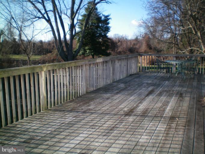613 Truxton Road Annapolis, MD 21409 - Photo 14 of 24 a balcony with wooden floor