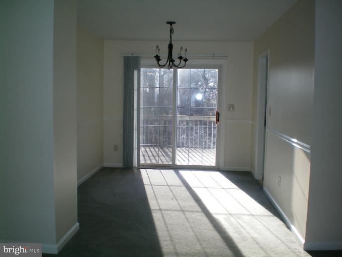613 Truxton Road Annapolis, MD 21409 - Photo 17 of 24 a view of an empty room and window