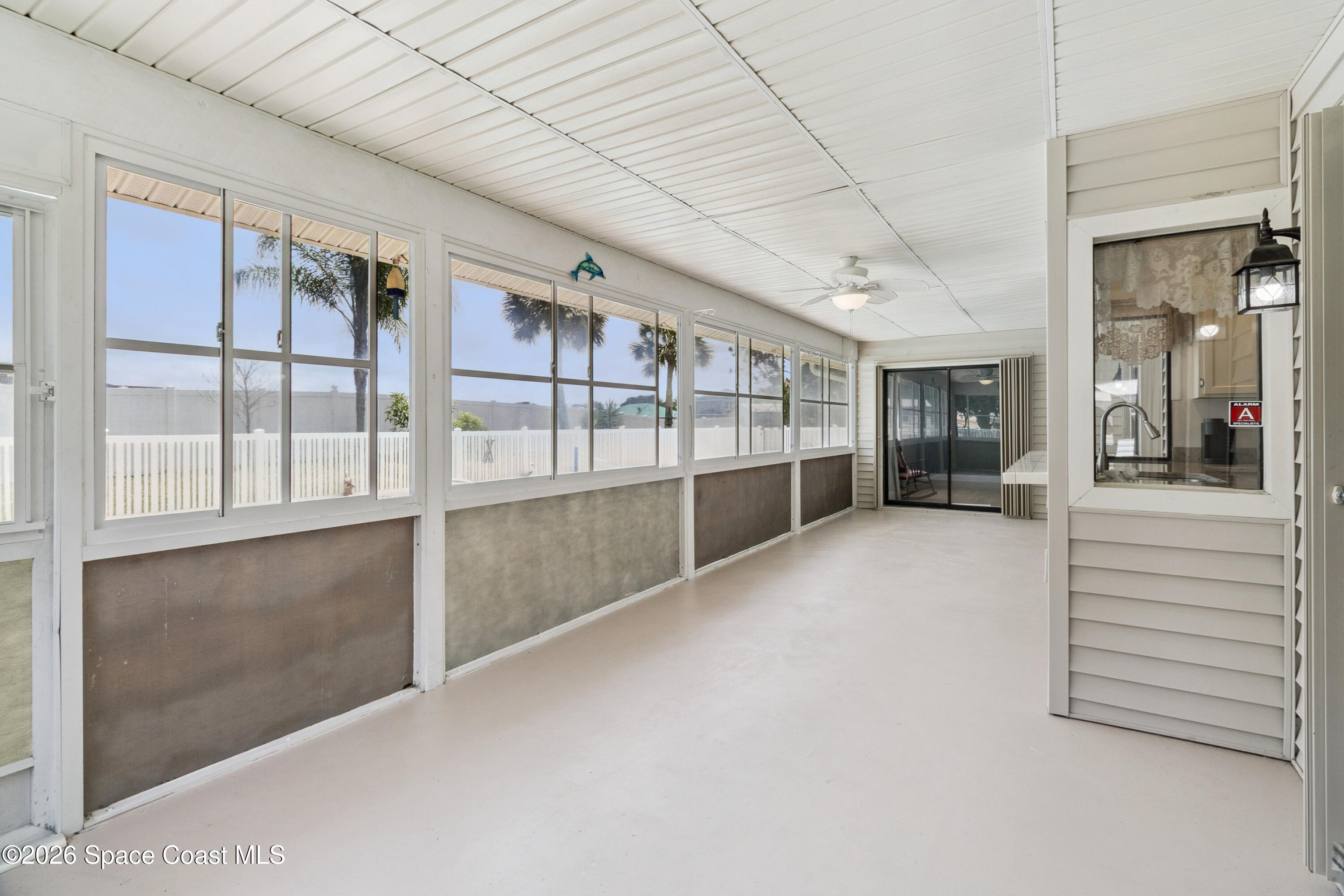 1334 Cherry Hills Road Northeast Palm Bay, FL 32905 - Photo 39 of 58 Enclosed Porch