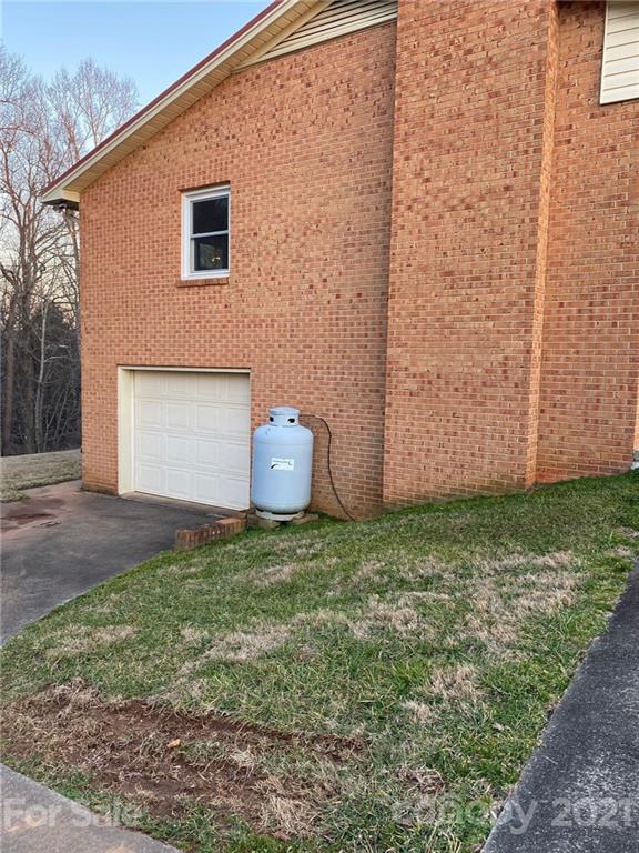 4903 Horseshoe Bend Road Hudson, NC 28638 - Photo 2 of 26 a house view with a backyard space