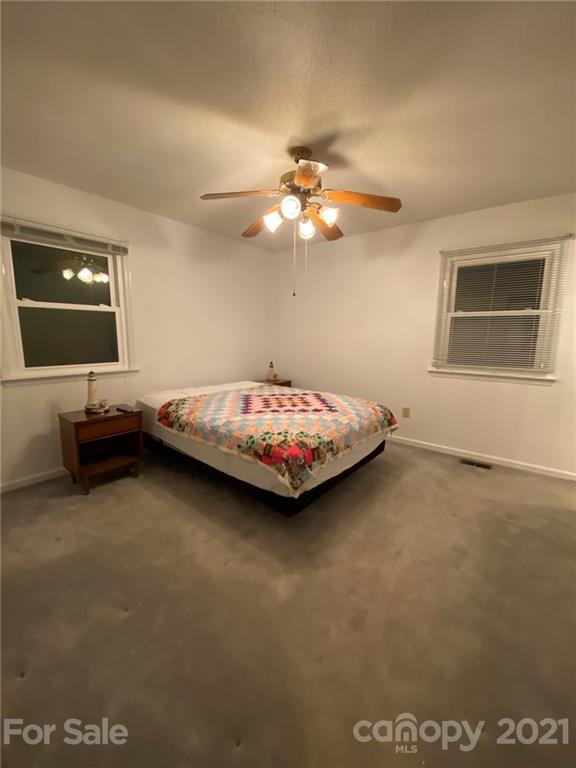 4903 Horseshoe Bend Road Hudson, NC 28638 - Photo 17 of 26 a bedroom with bed and window