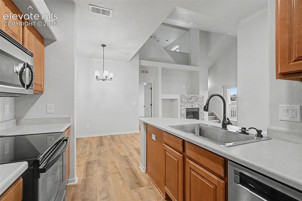 5353 Palomino Ranch Point, Unit 307 Colorado Springs, CO 80922 - Photo 9 of 30 New SS deep sink and recessed lighting