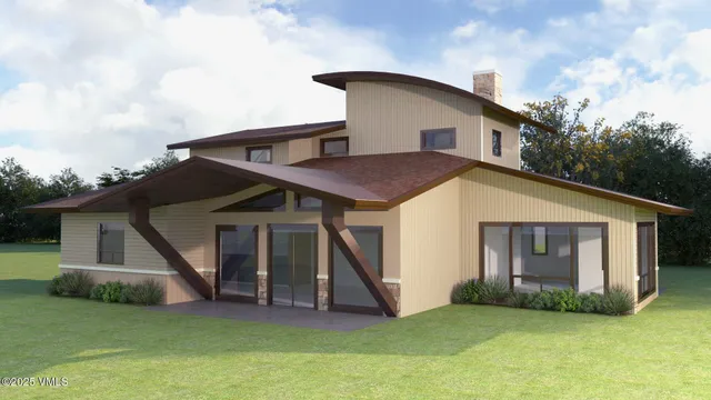 a view of a house with yard and porch