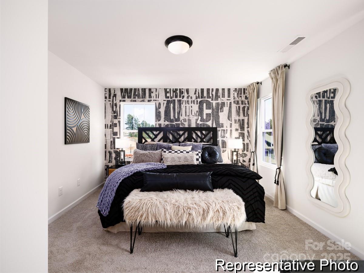 405 Drawbar Drive, Unit 131 Clover, SC 29710 - Photo 17 of 28 a bedroom with a bed and window