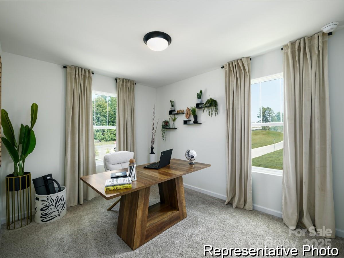 405 Drawbar Drive, Unit 131 Clover, SC 29710 - Photo 23 of 28 a living room with furniture and a window