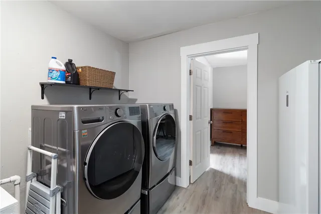 a view of livingroom with washer and dryer