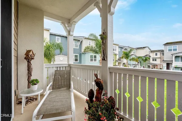 a view of balcony with furniture