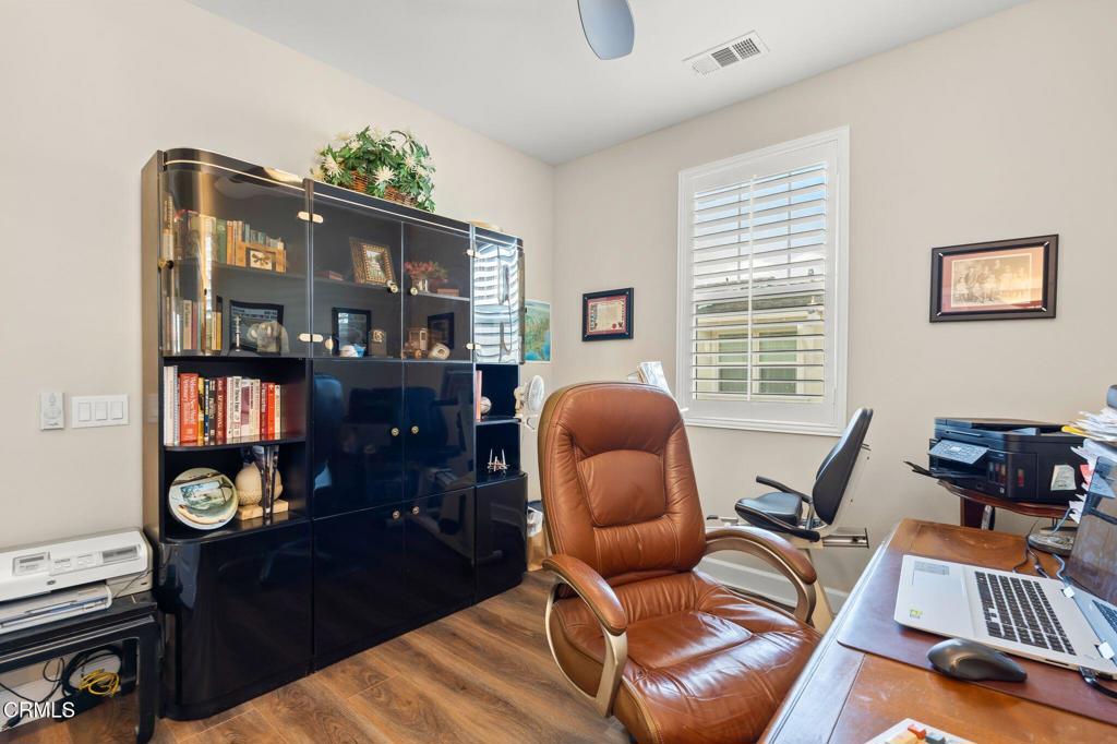3729 Islander Walk Oxnard, CA 93035 - Photo 22 of 46 a bedroom with furniture and a window