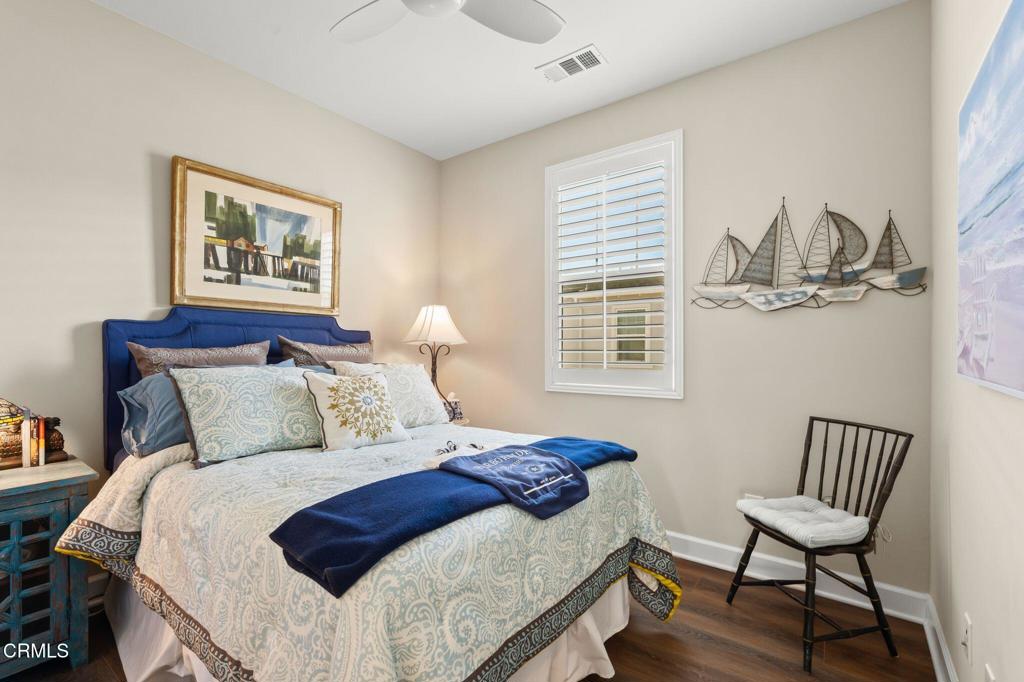 3729 Islander Walk Oxnard, CA 93035 - Photo 31 of 46 a bedroom with a bed and a window