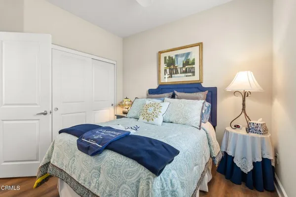 a bathroom with a sink toilet and mirror