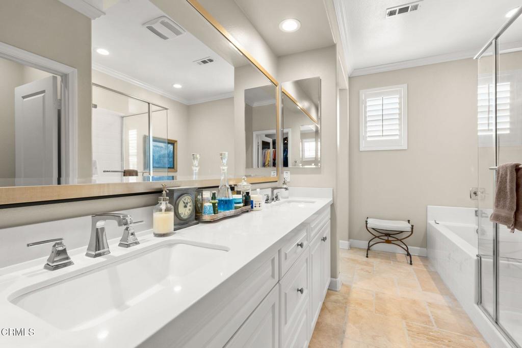 3729 Islander Walk Oxnard, CA 93035 - Photo 33 of 46 a bathroom with a sink a toilet and a mirror