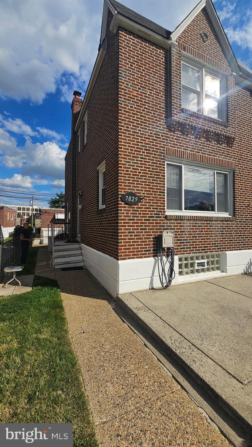 7829 Horrocks Street Philadelphia, PA 19152 - Photo 1 of 46 a front view of a house with yard