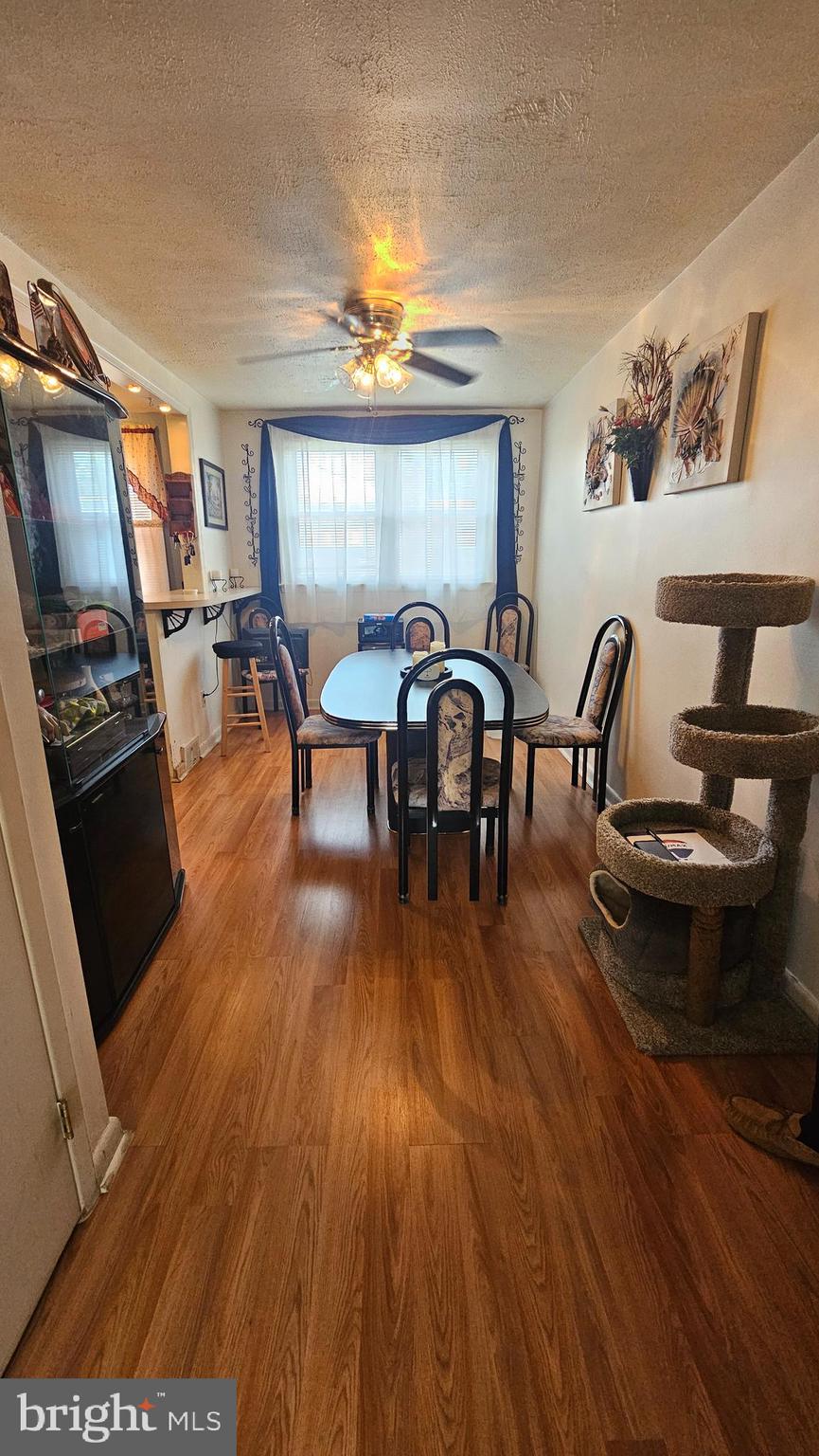 7829 Horrocks Street Philadelphia, PA 19152 - Photo 14 of 46 a living room with furniture and a wooden floor