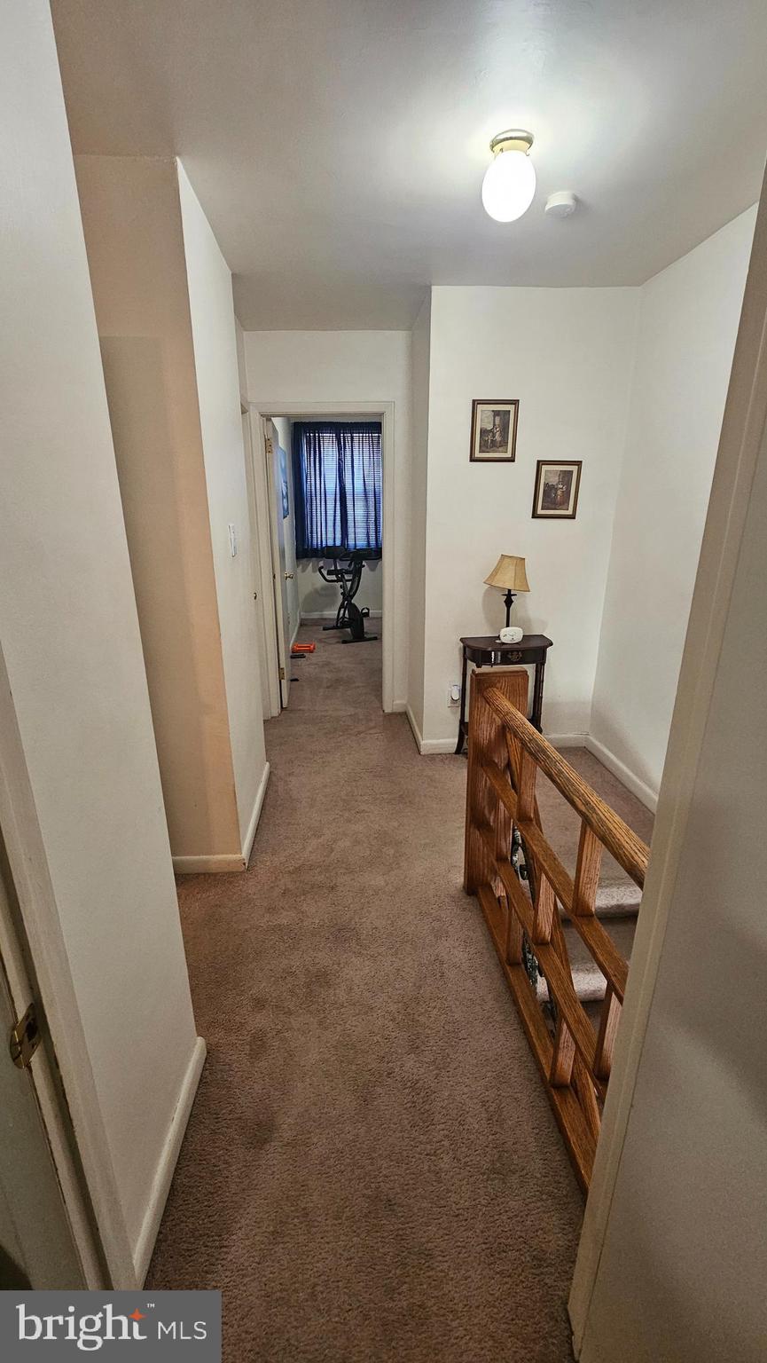7829 Horrocks Street Philadelphia, PA 19152 - Photo 26 of 46 a view of a hallway with workspace