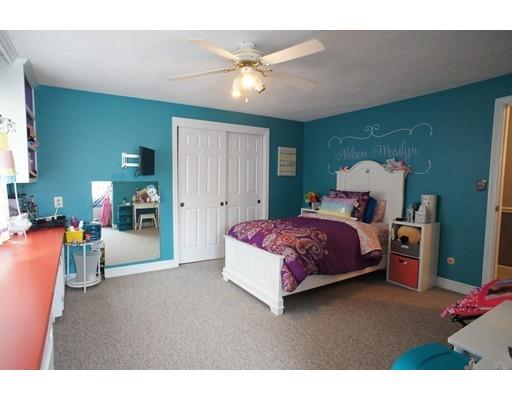 3 Helen Road Braintree, MA 02184 - Photo 12 of 18 a bedroom with a bed and a chandelier